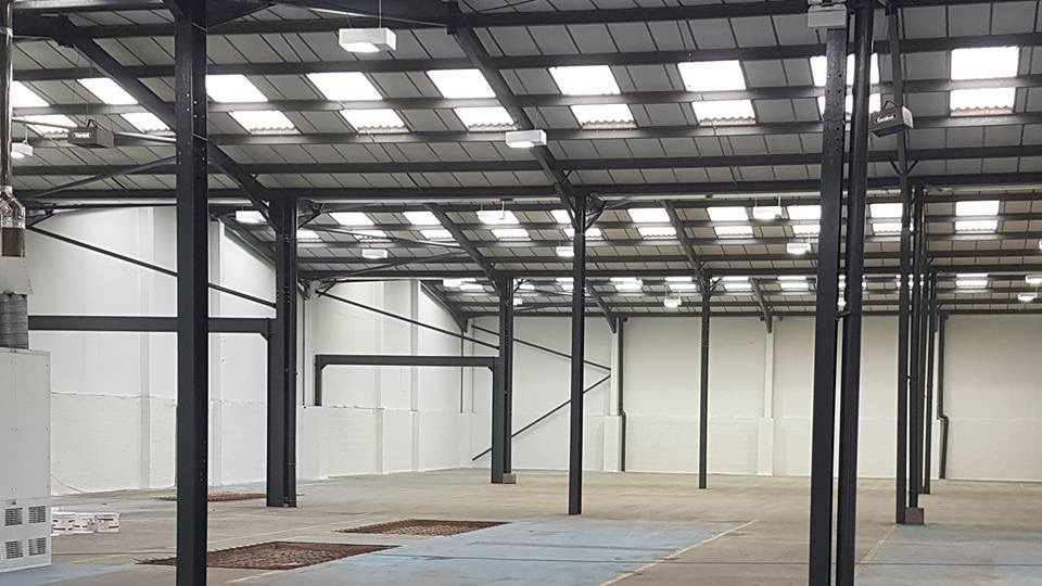 Steel girders inside a warehouse, refurbished by Refurb