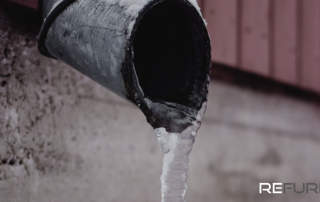 A leaky pipe with an icicle hanging out of it